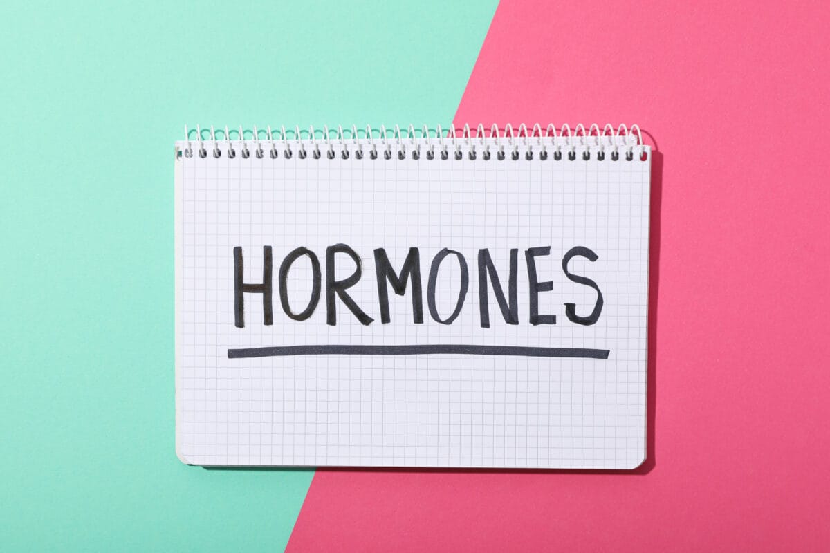 Hormonal balance concept illustrated with hormones note representing natural regulation in the body
